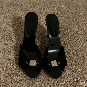 CHANEL Black Patent Leather Open-Toe Mules with Silver Logo Plaques